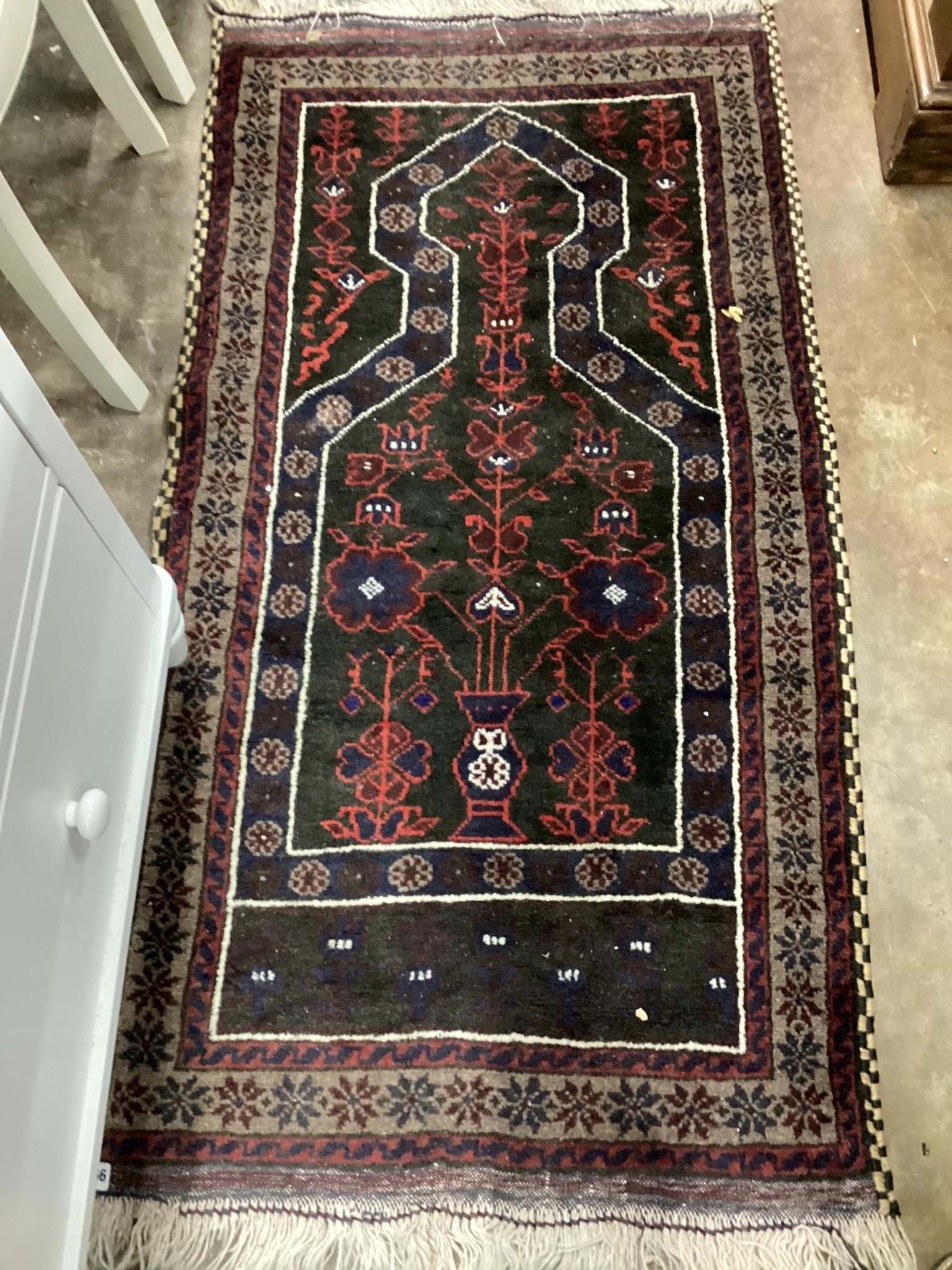 A Belouch blue ground prayer rug, 140 x 74cm